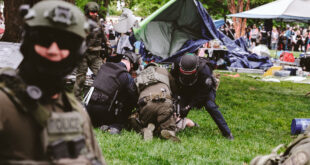 The University of Virginia said 25 were arrested for trespassing after clearing a pro-Palestinian encampment on campus